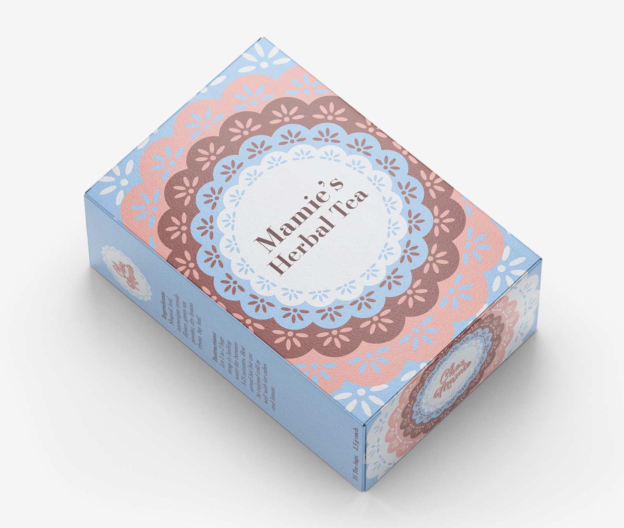 Mockup of packaging design for tea box or fictional company Chez Mamie. The design features a circular doily pattern in different colours and the text "Mamie's Herbal Tea" at the centre.